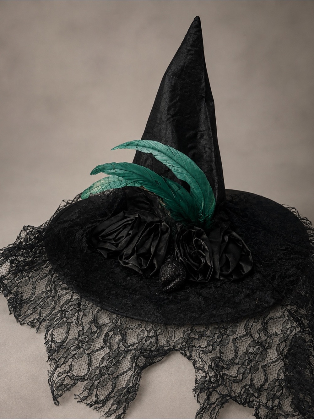 Black Witch Hat with Green Feather Accent